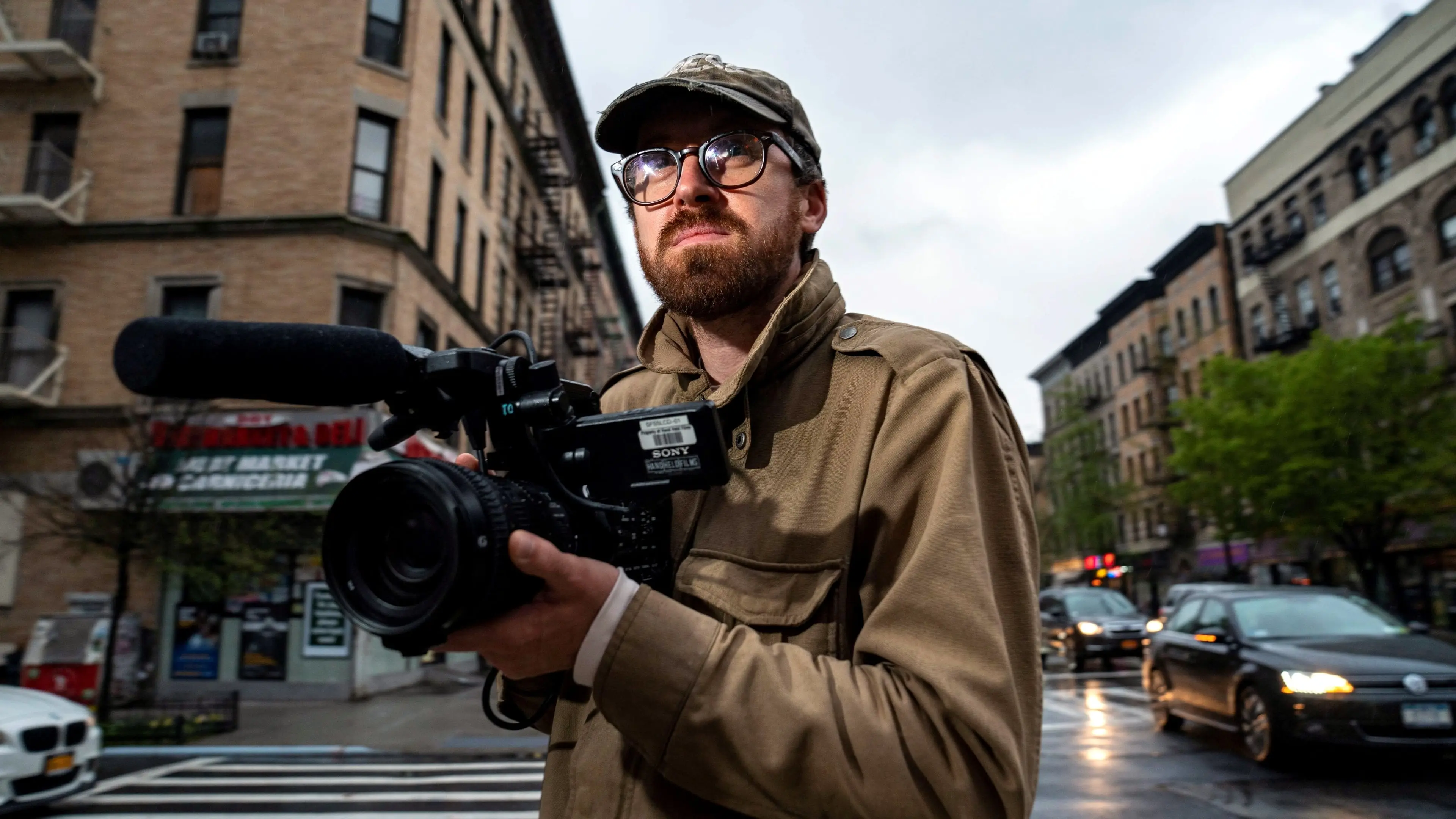 How To with John Wilson backdrop