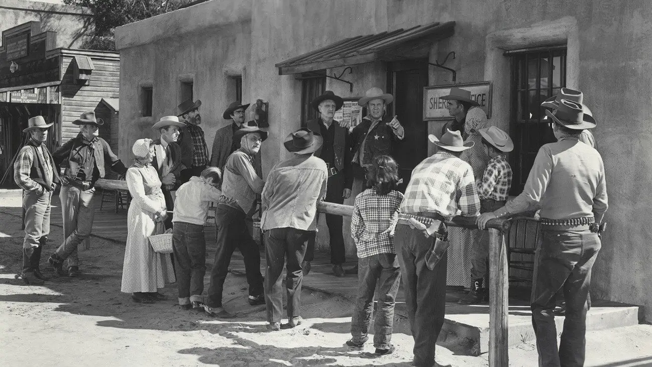 Two Guns and a Badge backdrop